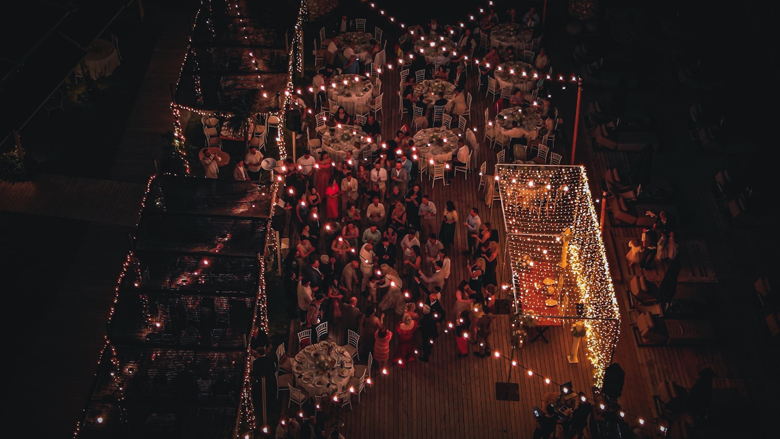 A large wedding celebration photographed from above